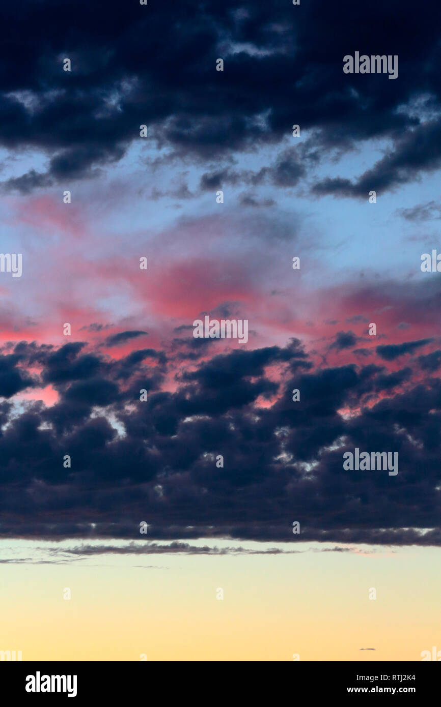 Clouds on sunset sky, background Stock Photo - Alamy