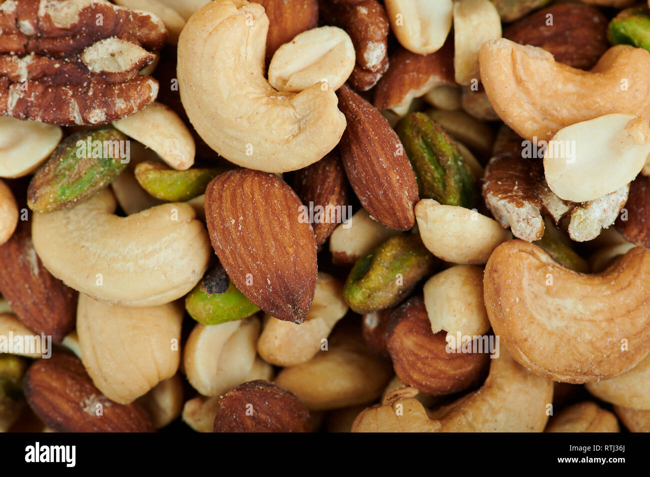 Assortment of dry nuts clsoe up view. Diet eating theme Stock Photo Alamy