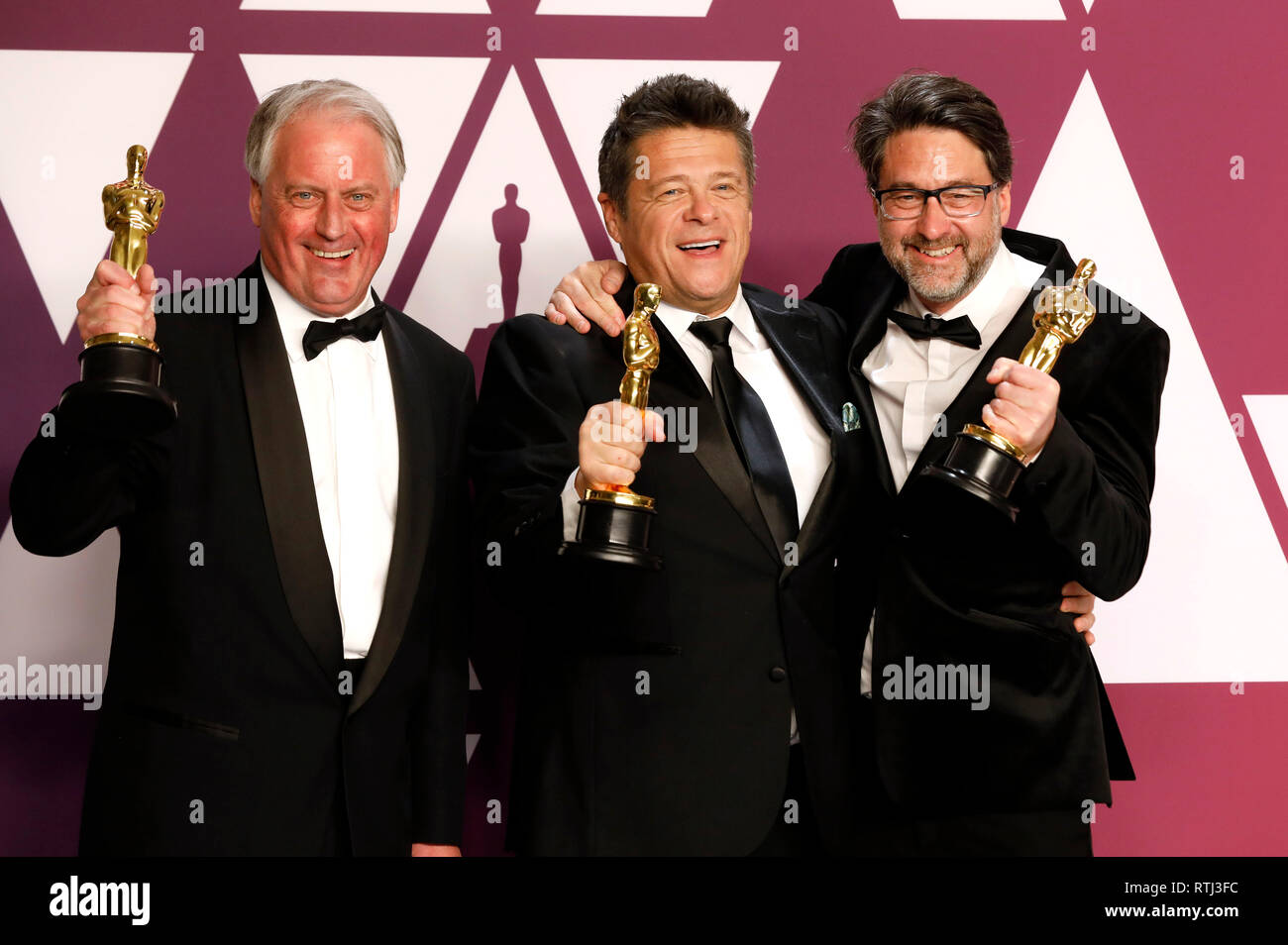 Paul Massey, Tim Cavagin und John Casali mit dem Oscar für den Besten Tonschnitt in 'Bohemian Rhapsody' im Press Room der Oscar Verleihung 2019 / 91st Annual Academy Awards im Hollywood & Highland Center. Los Angeles, 24.02.2019 Stock Photo