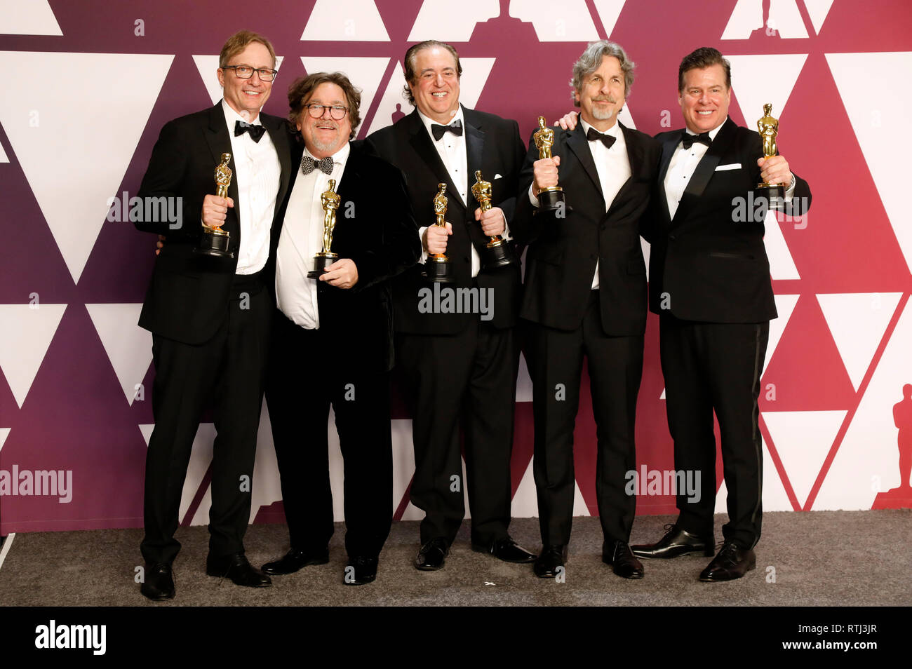 Jim Burke, Charles B. Wessler, Nick Vallelonga, Peter Farrelly, and Brian Currie, winners of Best Picture for 'Green Book,' pose in the press room at the 91st Annual Academy Awards at Hollywood and Highland Center on February 24, 2019 in Hollywood, California. Stock Photo