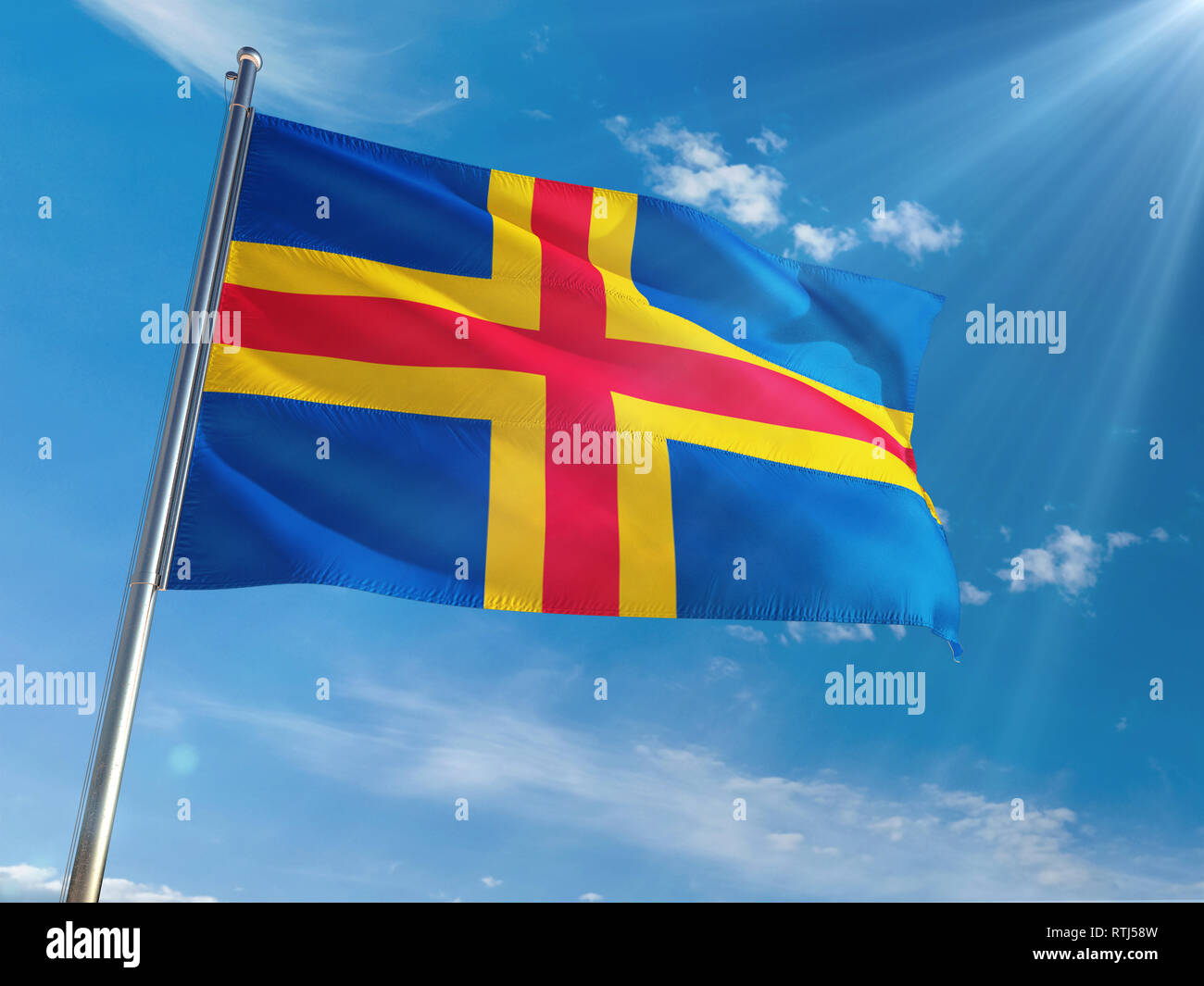 Aland Islands National Flag Waving on pole against sunny blue sky background. High Definition Stock Photo