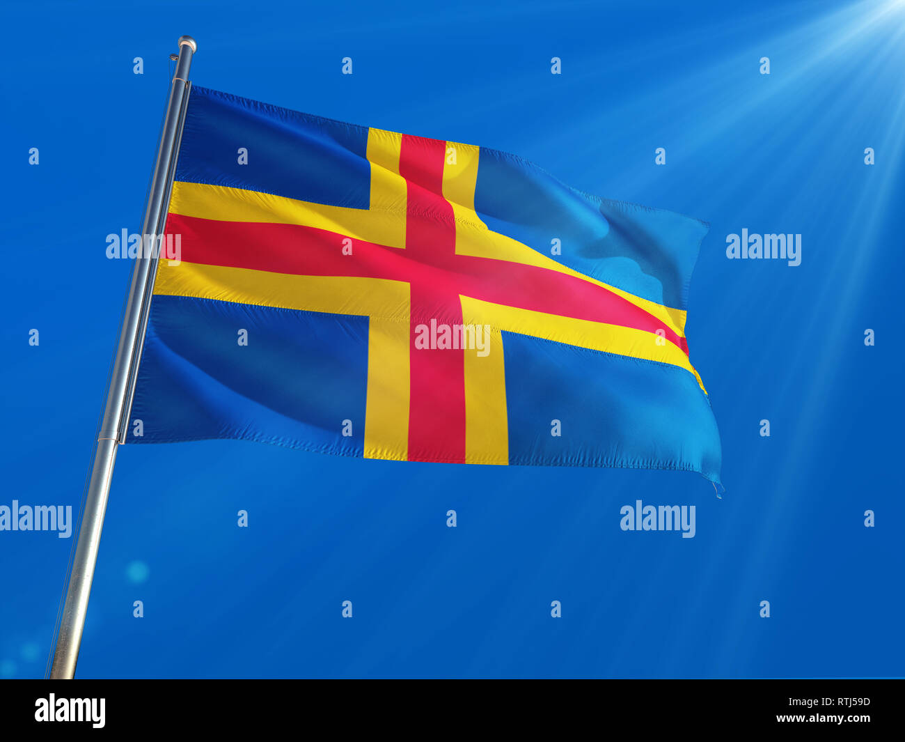 Aland Islands National Flag Waving on pole against deep blue sky background. High Definition Stock Photo