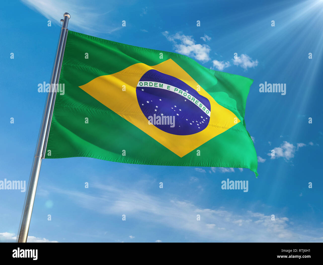 Brazil National Flag Waving On Pole Against Sunny Blue Sky Background High Definition Stock Photo Alamy
