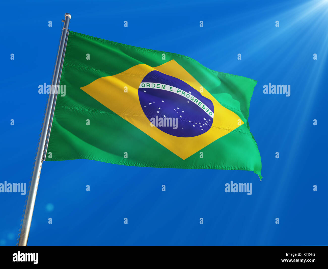 Brazil National Flag Waving On Pole Against Deep Blue Sky Background High Definition Stock Photo Alamy