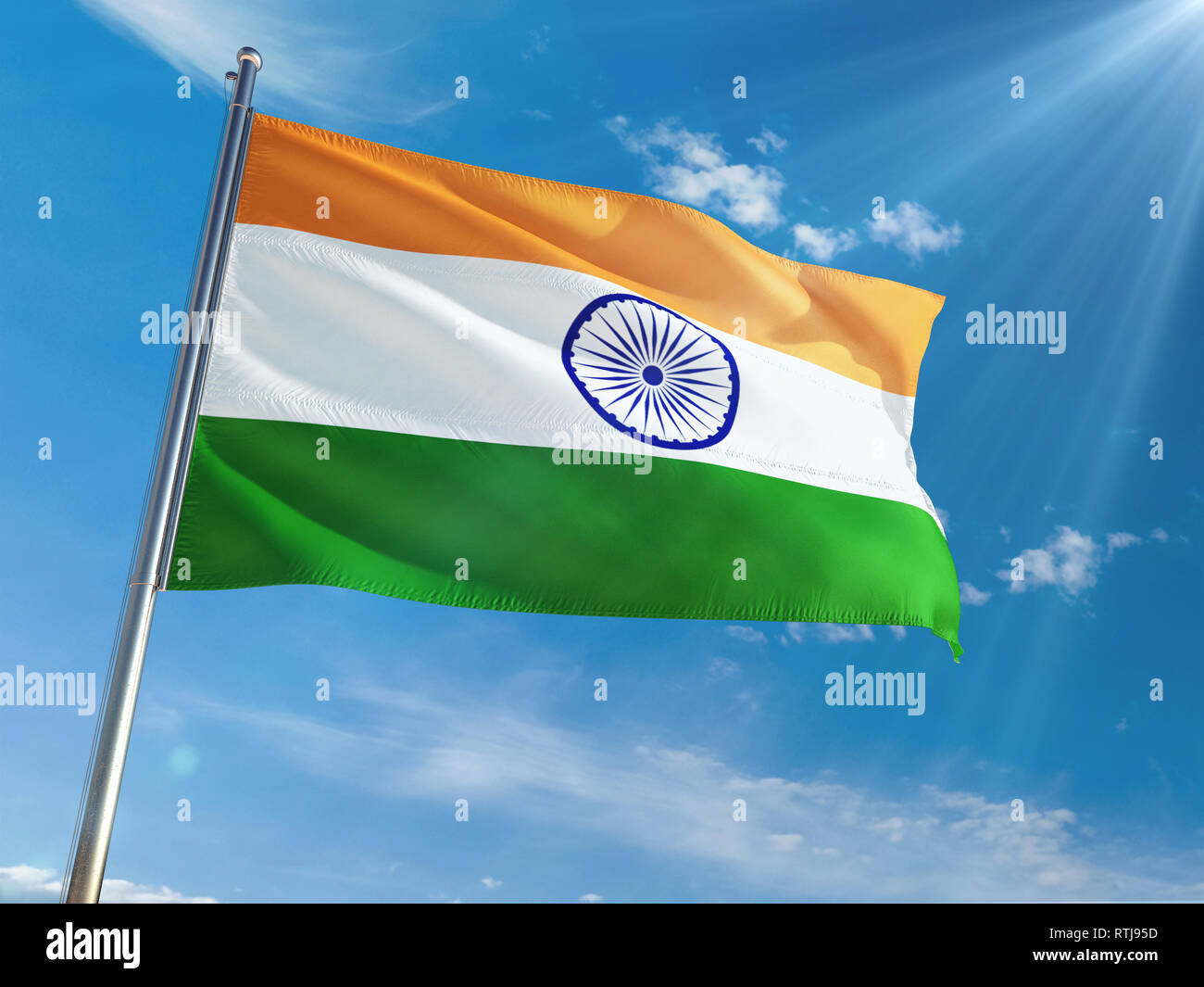 India National Flag Waving on pole against sunny blue sky background. High  Definition Stock Photo - Alamy