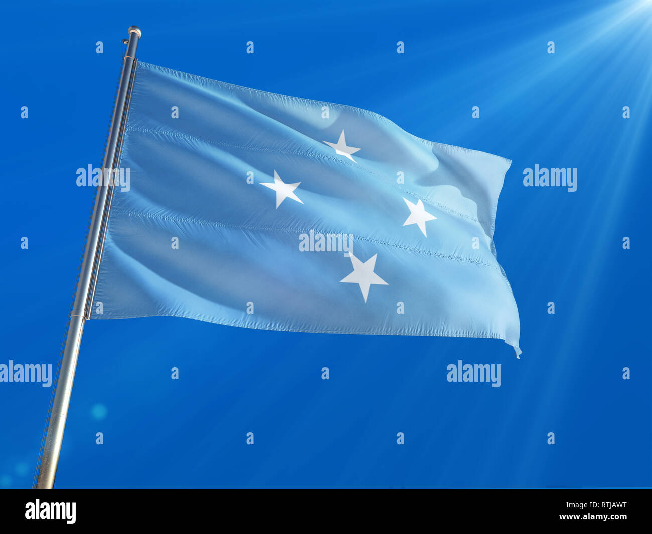Micronesia National Flag Waving on pole against deep blue sky