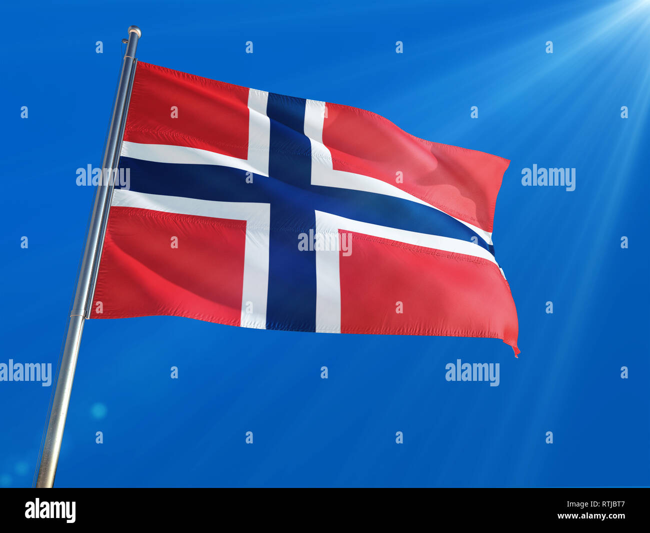 Norway National Flag Waving on pole against deep blue sky background ...