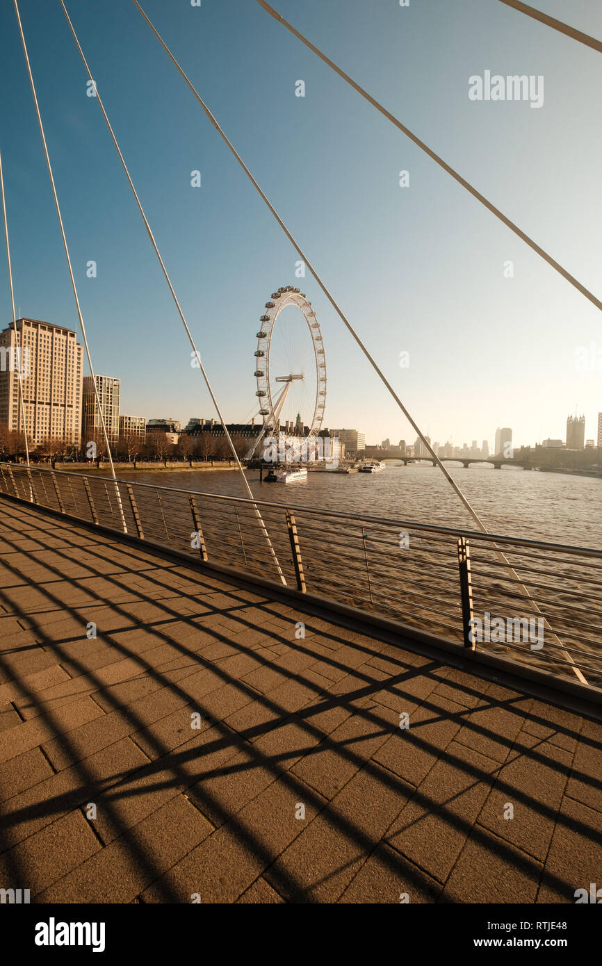 LONDON, UK, February 24, 2019: London Eye view from Golden Jubilee Bridge Stock Photo
