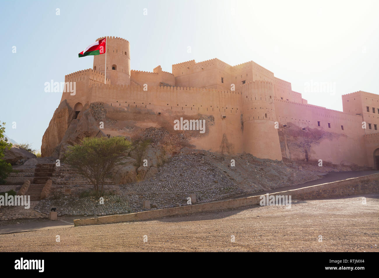 Ancient Fort of Nakhal with flag (Oman) Stock Photo