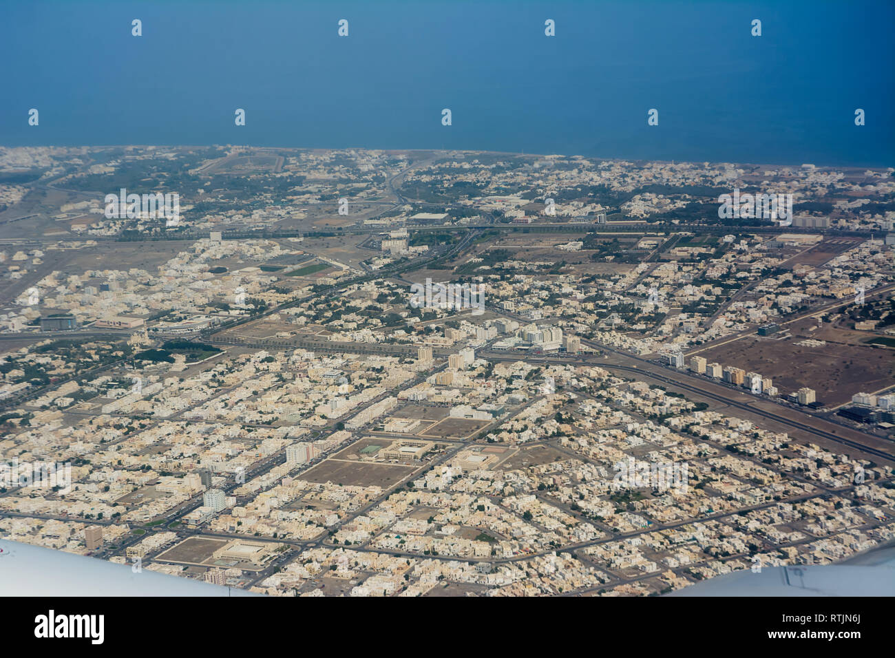 View from the plane of the city of Seeb, near Muscat (Oman) Stock Photo