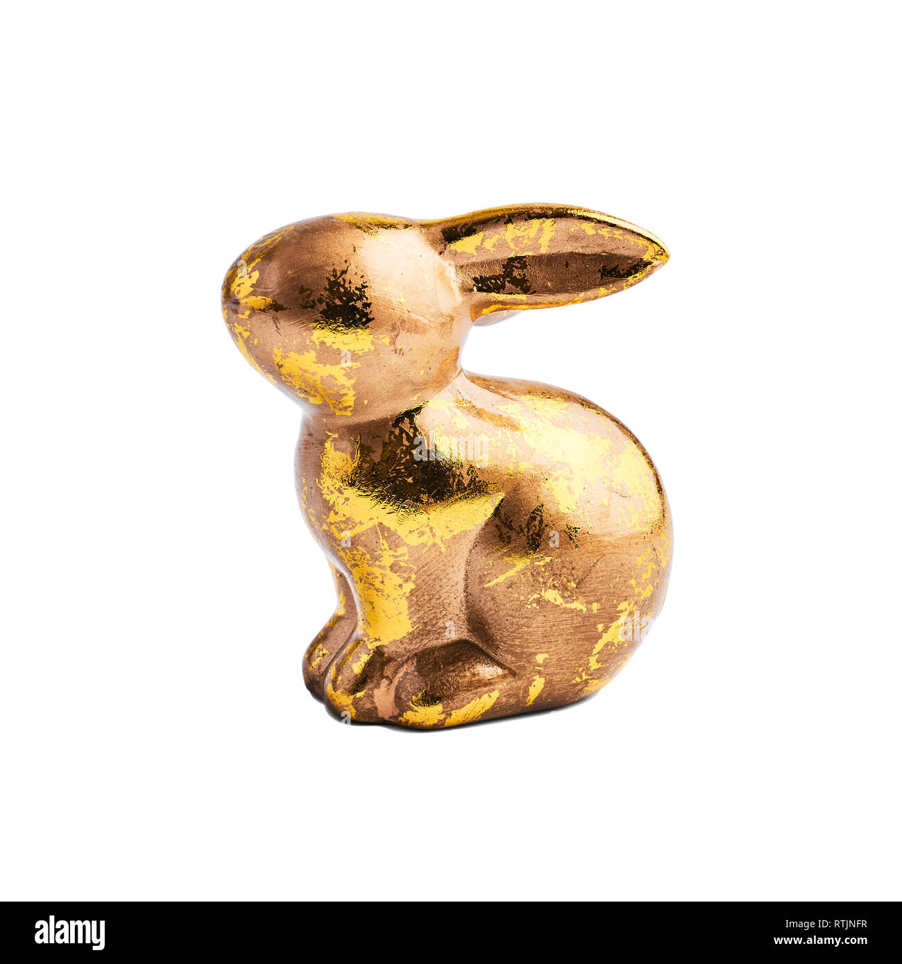 Golden rabbit figure isolated on white background. Design element. Stock Photo