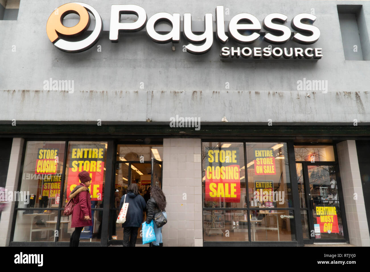A Payless ShoeSource store on Fulton Street in Downtown Brooklyn in New York is festooned with closing signs on Saturday, February 23, 2019. The retailer is closing all of its 2100 stores in the U.S. and Puerto Rico, and its Payless.com website, as it files for bankruptcy. (Â© Richard B. Levine) Stock Photo