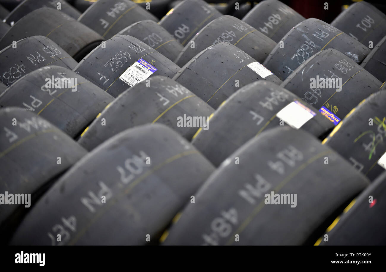 Hampton, GA, USA. 23rd Feb, 2018. A row of Goodyear tires are placed outside the garage area during Monster Energy Cup Series practice on Saturday at Atlanta Motor Speedway in Hampton, GA. Austin McAfee/CSM/Alamy Live News Stock Photo