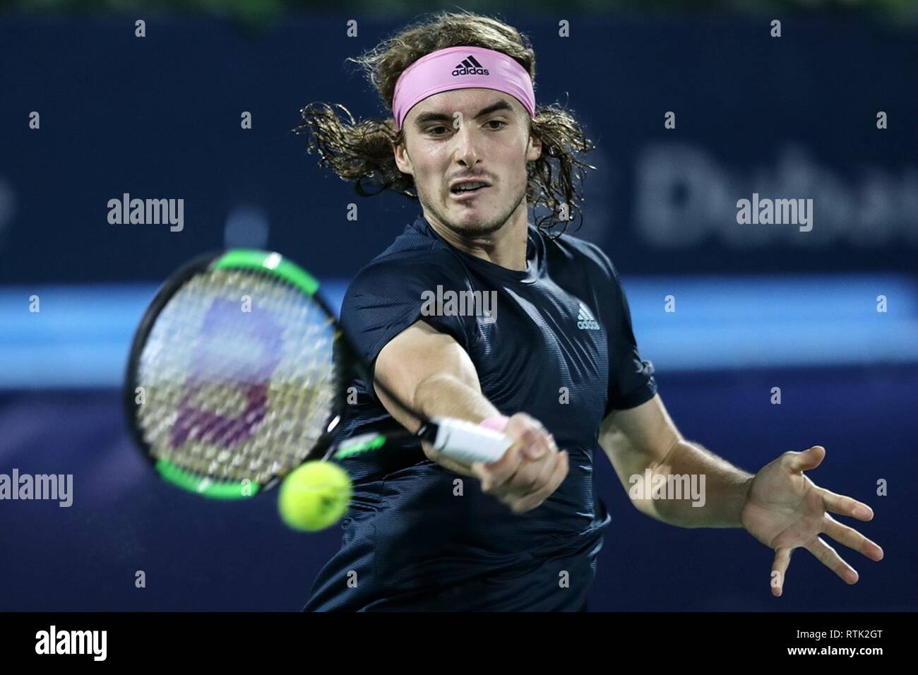 Dubai, United Arab Emirates. 1st Mar, 2019. Stefanos Tsitsipas of Greece  returns a shot during the singles semifinal match between Stefanos Tsitsipas  of Greece and Gael Monfils of France at the ATP