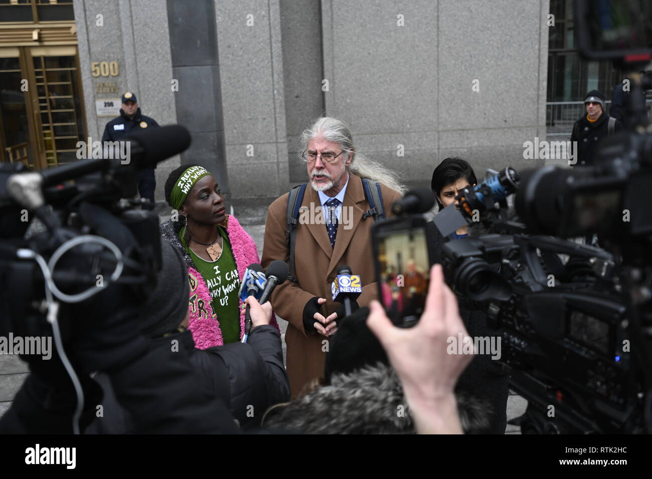 New York, NY, USA. 1 March 2019 New York US Statue of Liberty climber Patricia Okoumou and her lawyers speak to reporters outside federal court after a magistrate judge ordered her confined to her home with electronic monitoring.  Prosecutors had asked that her bail be revoked after she was arrested for climbing a school for immigrant children in Austin, Texas, in another act of civil disobedience to protest against Trump administration immigration policies. Credit: Joseph Reid/Alamy Live News Stock Photo