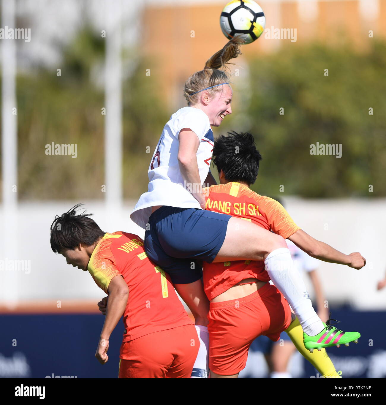 Albufeira, Portugal. 1st Mar, 2019. Norway's Ina Gausdal (Top) heads for the ball with China's Wang Shanshan (R) and Wang Shuang during the Group C match at the 2019 Algarve Cup women's soccer invitational tournament in Albufeira, Portugal, March 1, 2019. Norway won 3-1. Credit: Zhang Liyun/Xinhua/Alamy Live News Stock Photo