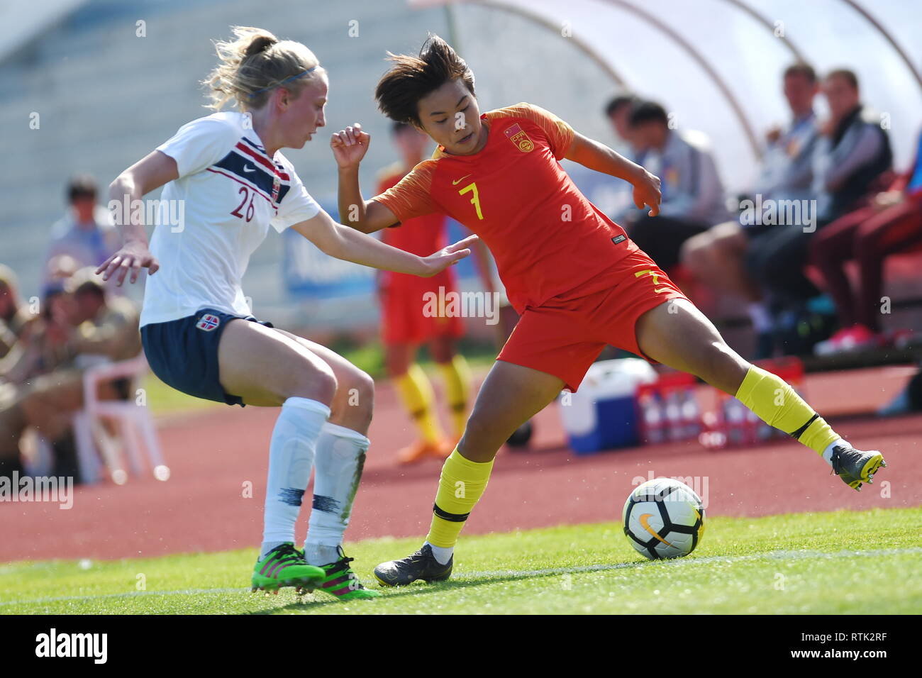 Albufeira, Portugal. 1st Mar, 2019. China's Wang Shuang (R) vies with Norway's Ina Gausdal during the Group C match at the 2019 Algarve Cup women's soccer invitational tournament in Albufeira, Portugal, March 1, 2019. Norway won 3-1. Credit: Zheng Huansong/Xinhua/Alamy Live News Stock Photo