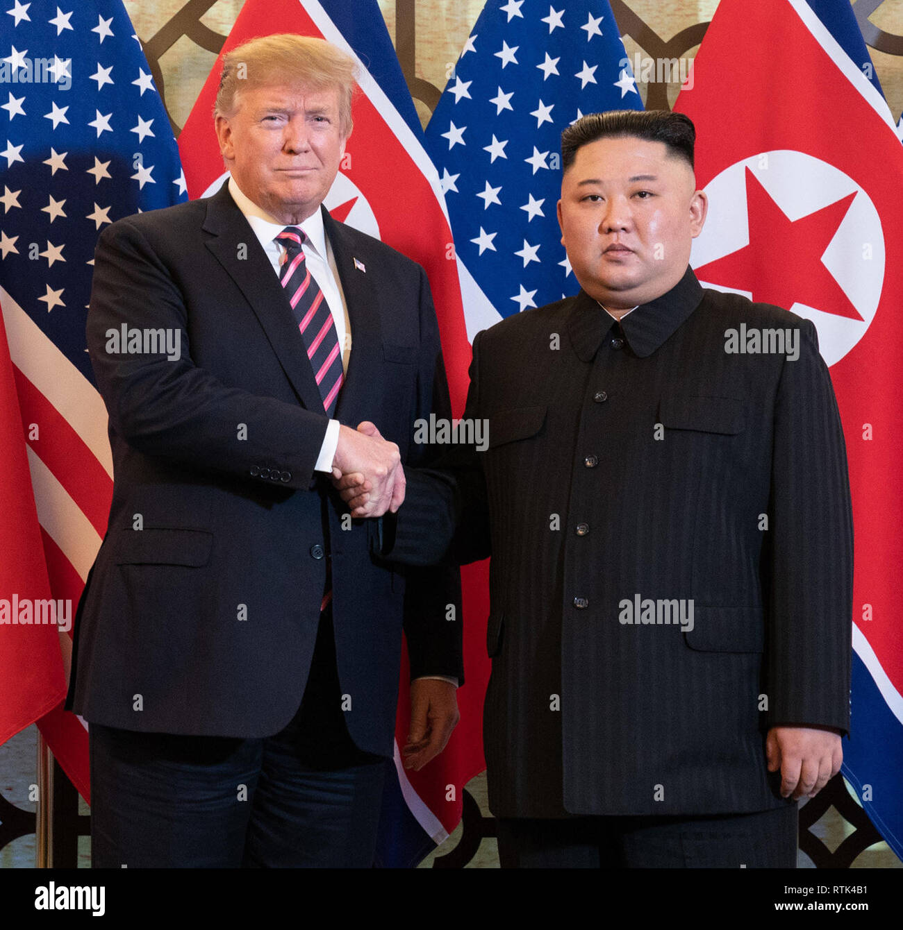 President Donald J. Trump is greeted by Kim Jong Un, Chairman of the State Affairs Commission of the Democratic People’s Republic of Korea, Wednesday, Feb. 27, 2019, at the Sofitel Legend Metropole hotel in Hanoi, for their second summit.   People:  President Donald Trump, Kim Jong Un Stock Photo