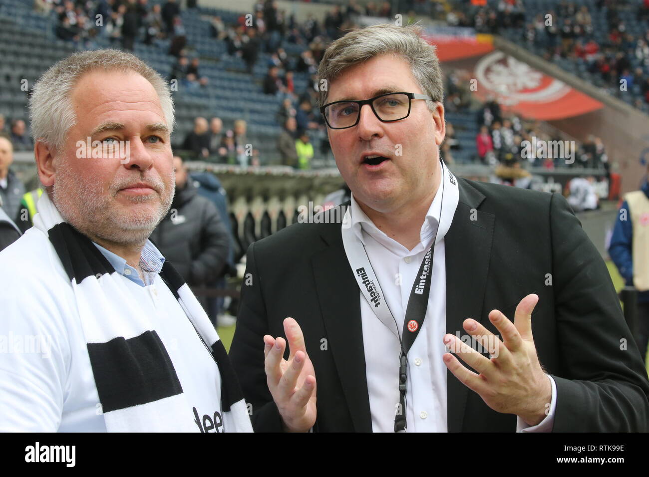 02 March 2019, Hessen, Frankfurt/M.: Soccer: Bundesliga, Eintracht Frankfurt - 1899 Hoffenheim, 24th matchday in the Commerzbank Arena. Computer virus expert and sponsor Jewgeni Walentinowitsch Kasperski (l) with Eintracht supervisory board member Axel Hellmann in the stadium. Photo: Thomas Frey/dpa - IMPORTANT NOTE: In accordance with the requirements of the DFL Deutsche Fußball Liga or the DFB Deutscher Fußball-Bund, it is prohibited to use or have used photographs taken in the stadium and/or the match in the form of sequence images and/or video-like photo sequences. Credit: dpa picture alli Stock Photo