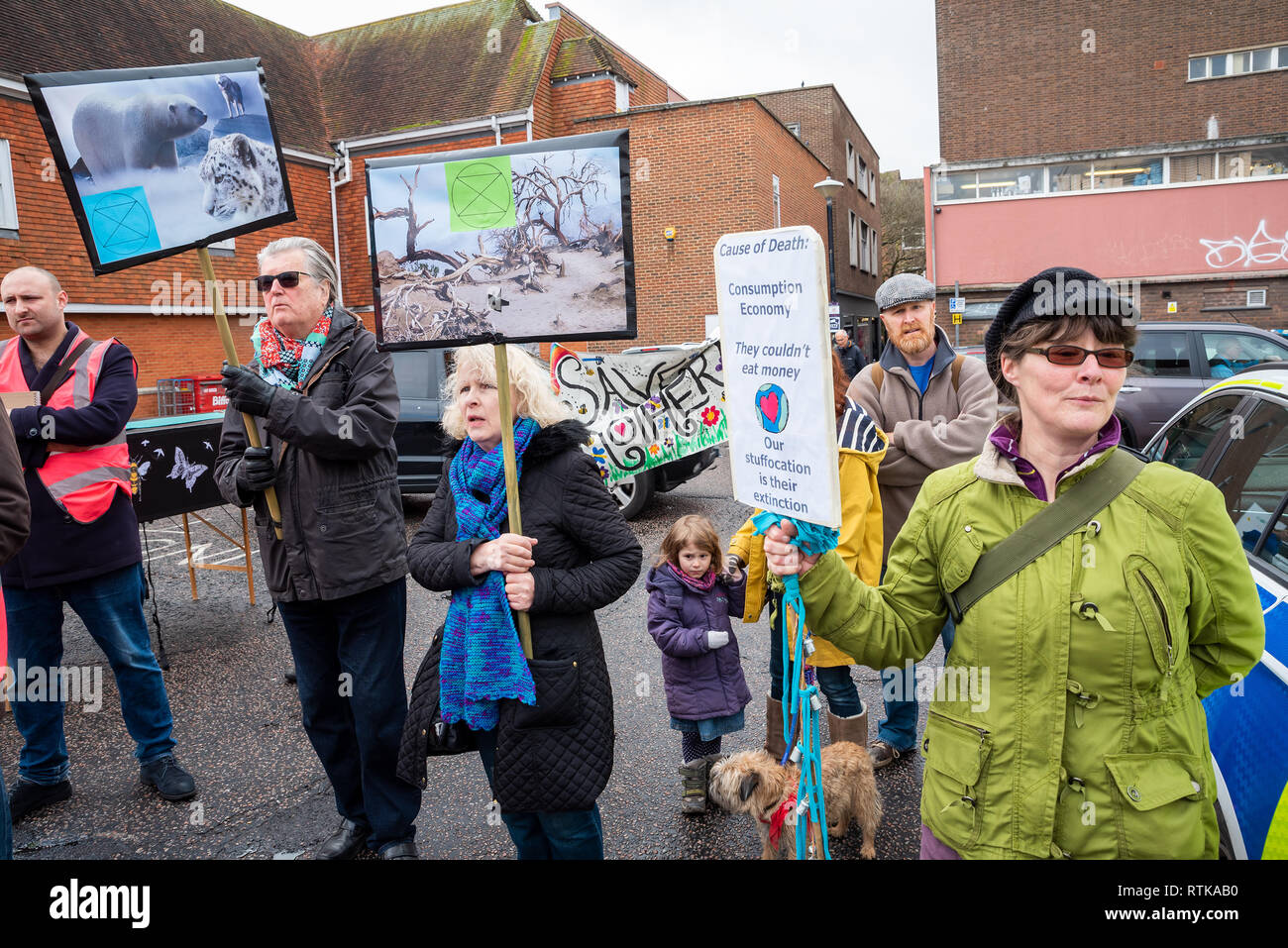 Canterbury, UK. 23rd February 2019. Supporters of the Canterbury Extinction Rebellion Group form up in the City Centre then take part in a symbolic funeral procession representing the death of plants, animals, humans and the planet due to the climate crisis, loss or life. The protest will culminated in a swarming action blocking St. Peters Place. Police were present but didn't interfere, there were no arrests. Credit: Stephen Bell/Alamy Live News Credit: Stephen Bell/Alamy Live News Stock Photo