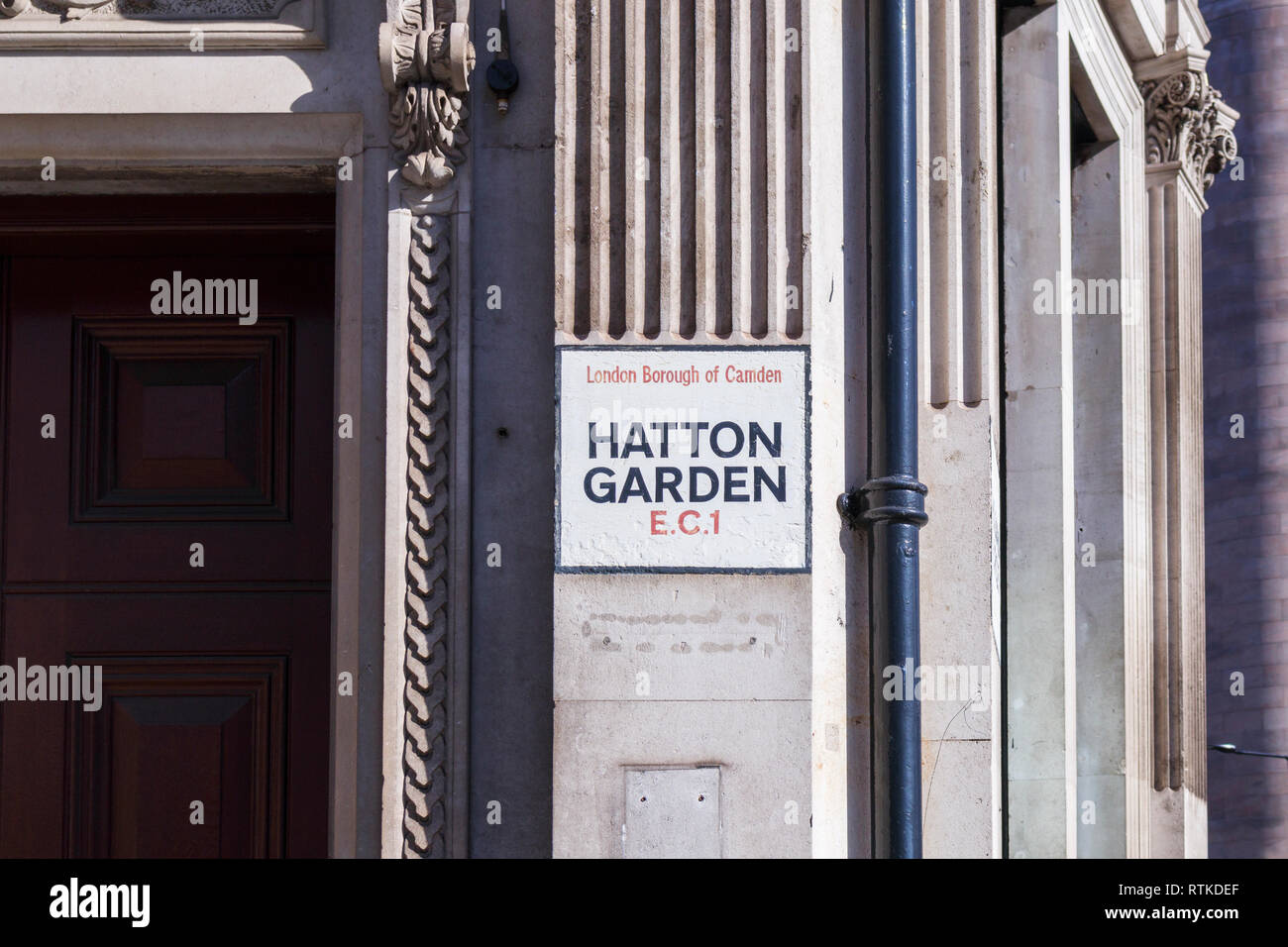 Painted street name sign at Hatton Garden, London Borough of Camden