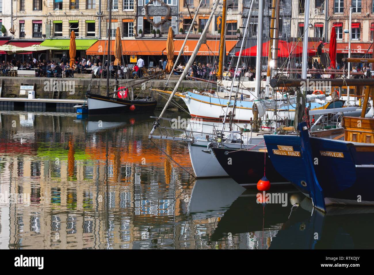 HONFLEUR, FRANCE - APRIL 8, 2018: view of the bay and the embankment  in the famous French city Honfleur. Normandy, France Stock Photo
