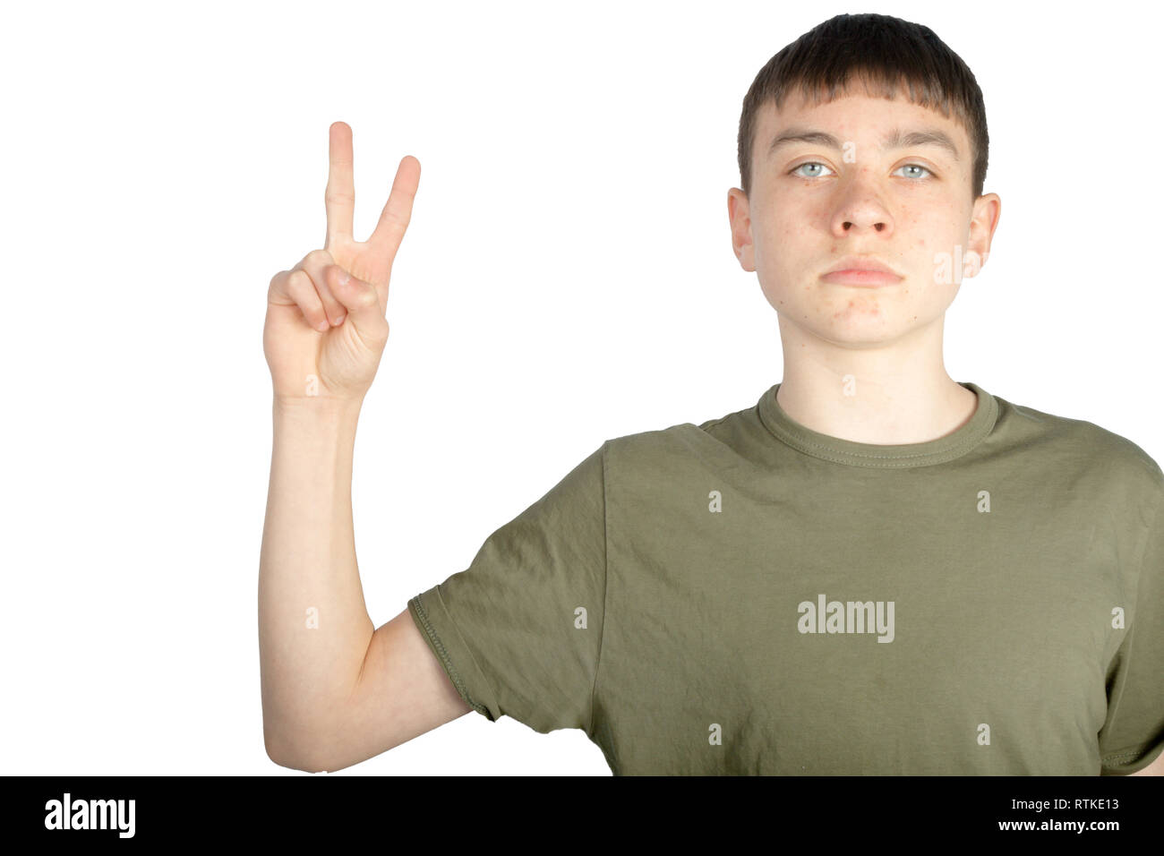 Caucasian teenage boy doing American Sign Language on one hand showing