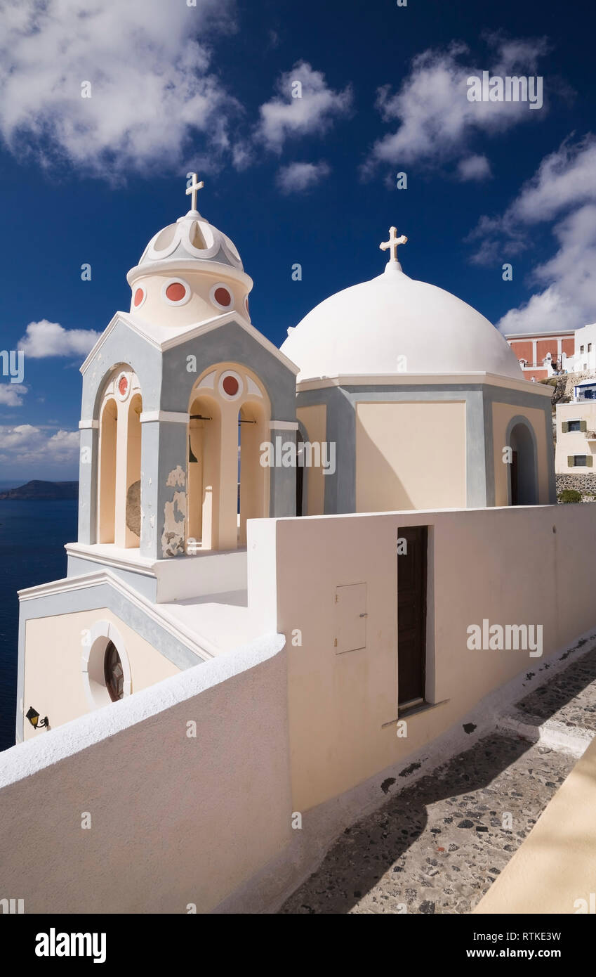 White domed chapel and bell tower, Fira village, Santorini, Greece Stock Photo