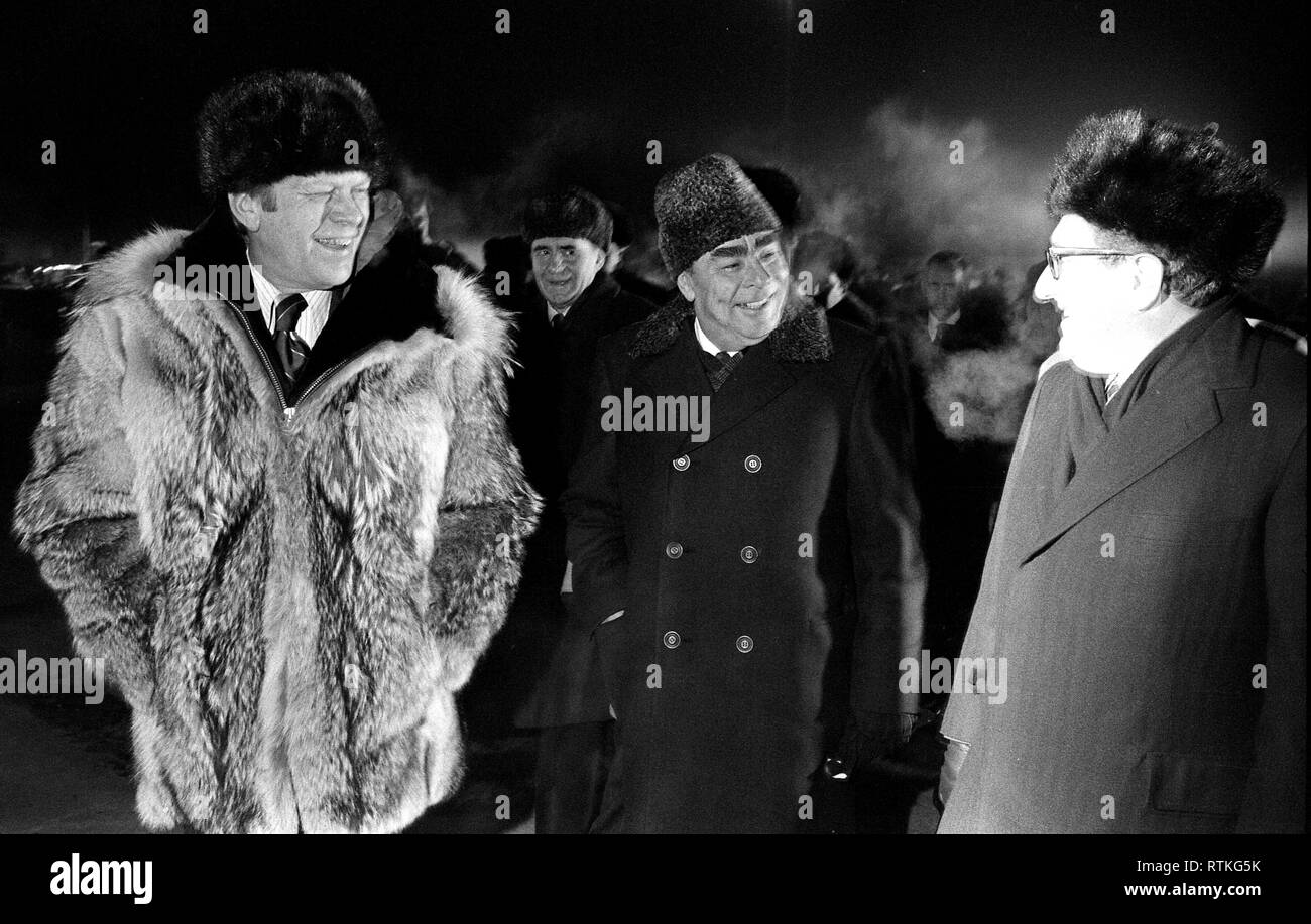 Photograph of President Gerald Ford, Secretary Leonid Brezhnev, and Henry Kissinger at the Conclusion of the Vladivostok Summit - November 24, 1974 Stock Photo