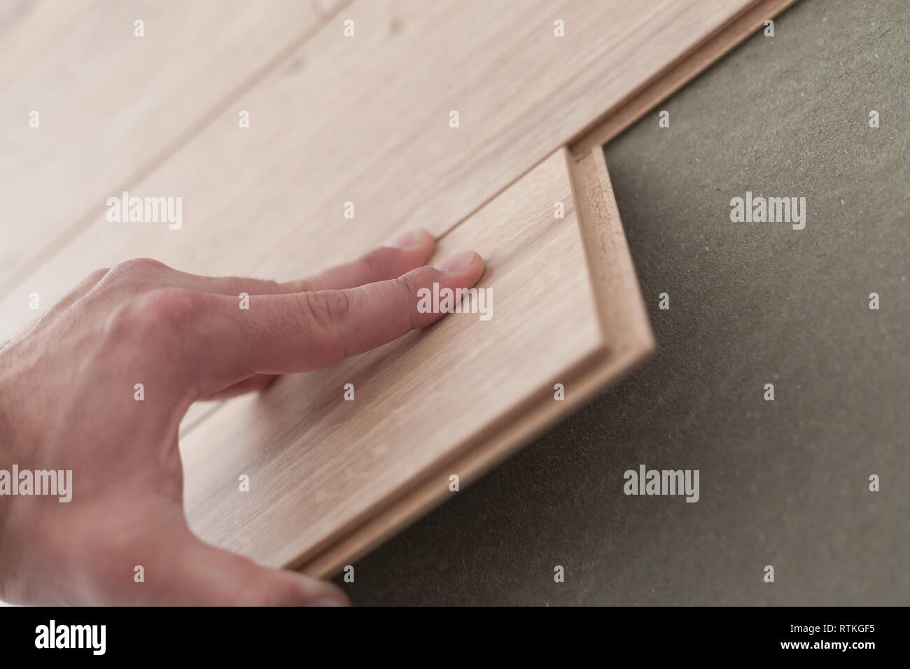 Young Man Laying A Vinyl Floor Shallow Dof Stock Photo 238916585