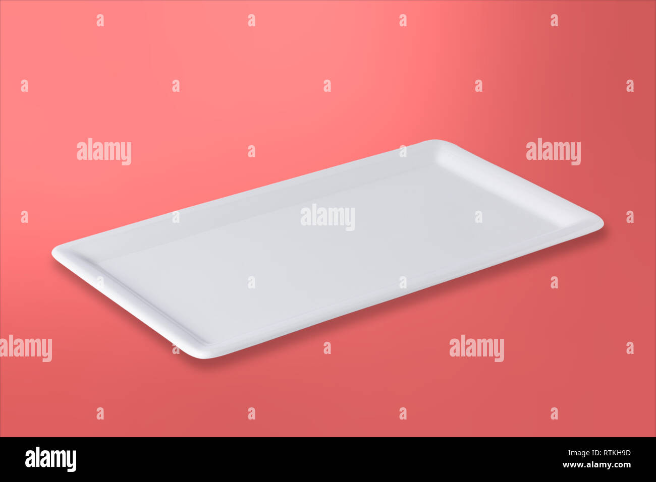 Empty white cornered plate on gradient red rose background, front view, oblique position Stock Photo