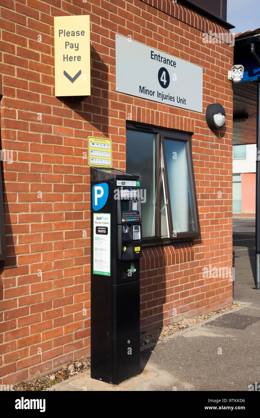 Car parking pay and display point with ticket machine in the car park