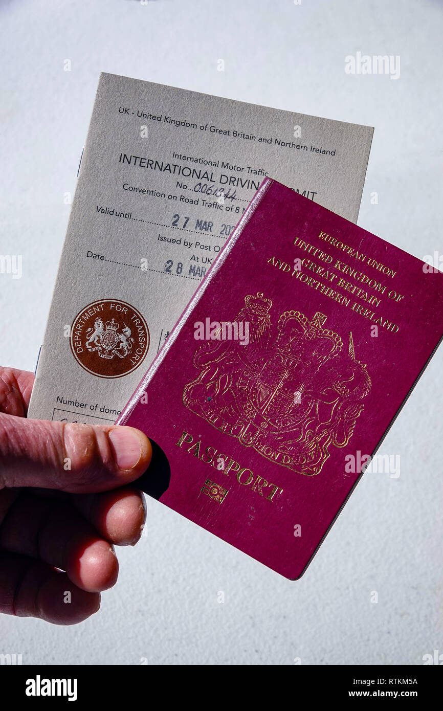 International Driving Permit and passport - Showing the 1968 and 1949 versions of the IDP which allow you to drive in certain countries in Europe use Stock Photo