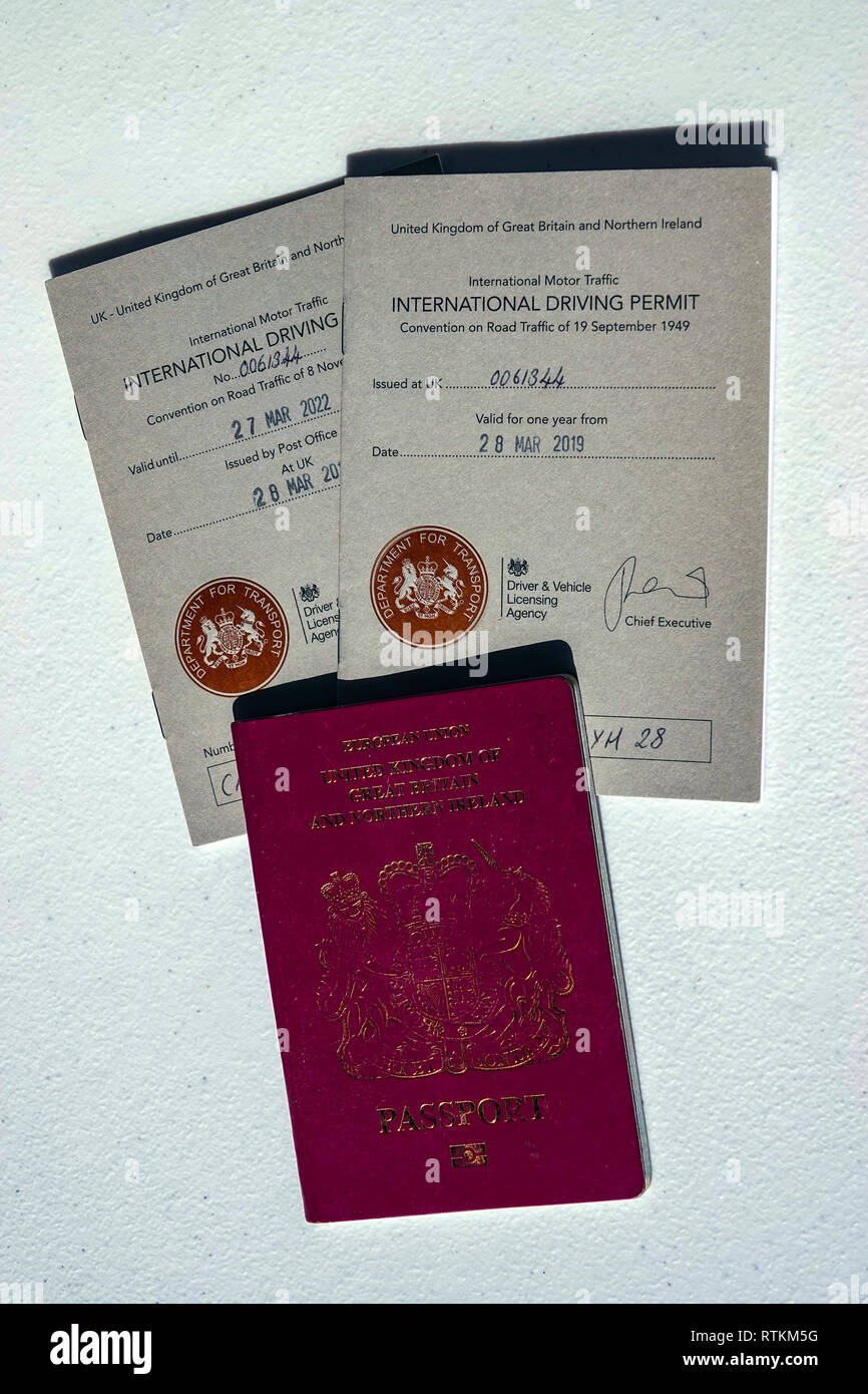 International Driving Permit and passport - Showing the 1968 and 1949 versions of the IDP which allow you to drive in certain countries in Europe use Stock Photo