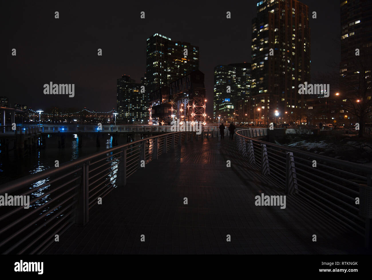 Night scenic of mid-town Manhattan from Gantry Plaza State Park in Long Island City, New York Stock Photo