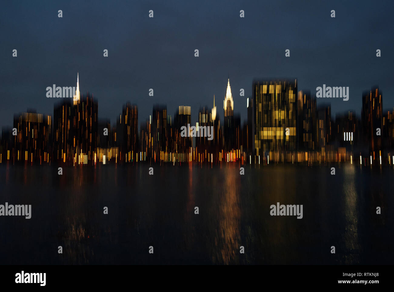 East River and New York City midtown skyline at night Stock Photo - Alamy