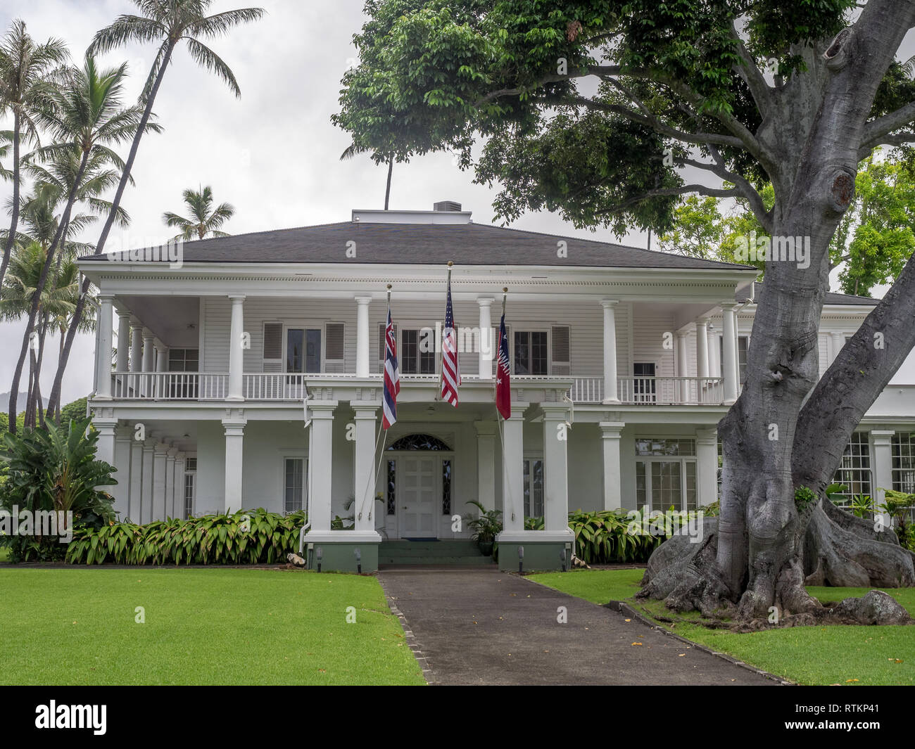 Washington Place on August 6, 2016 in Honolulu Hawaii. It is a Greek Revival palace in the Hawaii Capital Historic District in Honolulu, Hawaii. It is Stock Photo
