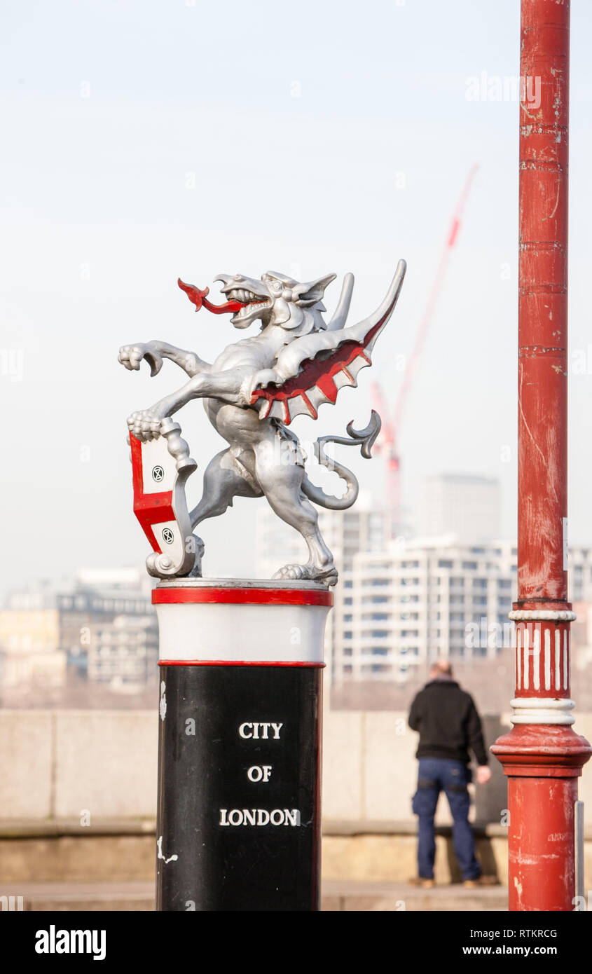 City of London,CBD,silver,Dragon,boundary,marker,entrance,on,south ,end,of,Blackfriars Bridge,cast,iron,statue,statues,London,England,English,UK,G.B., Stock Photo