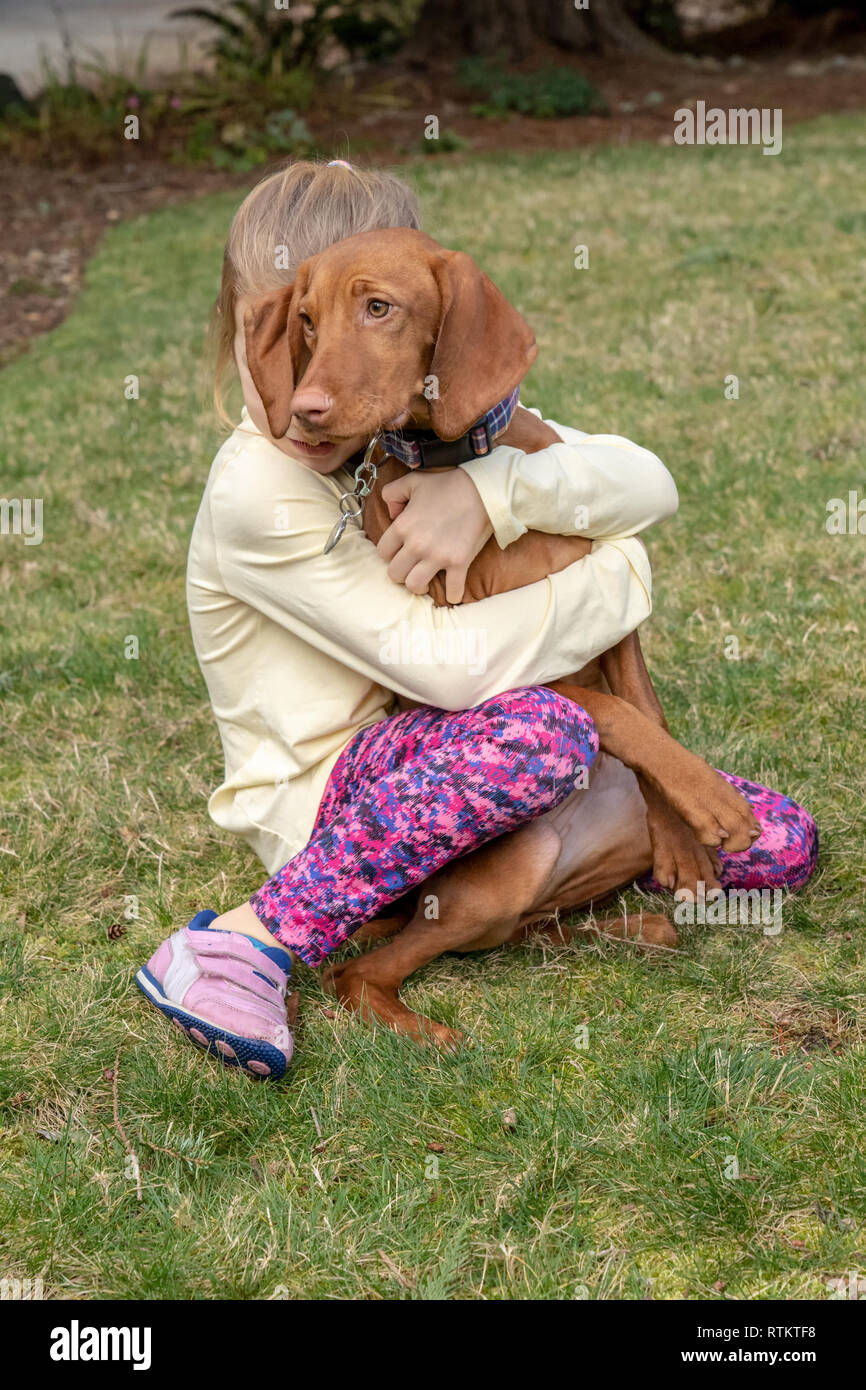 how old is five months in dog years