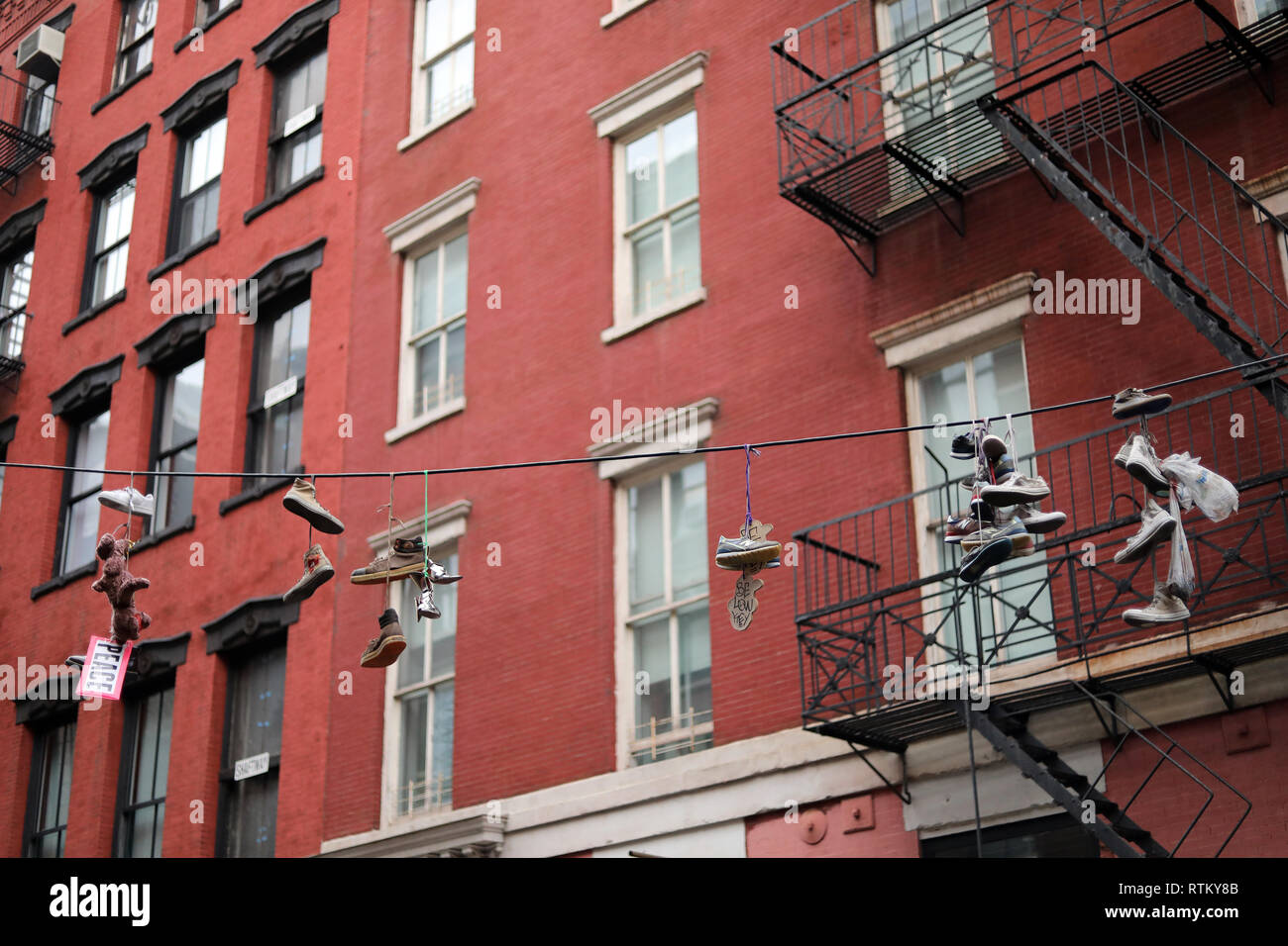 New York City, NY February 06, 2017 Various shoes hanging from a