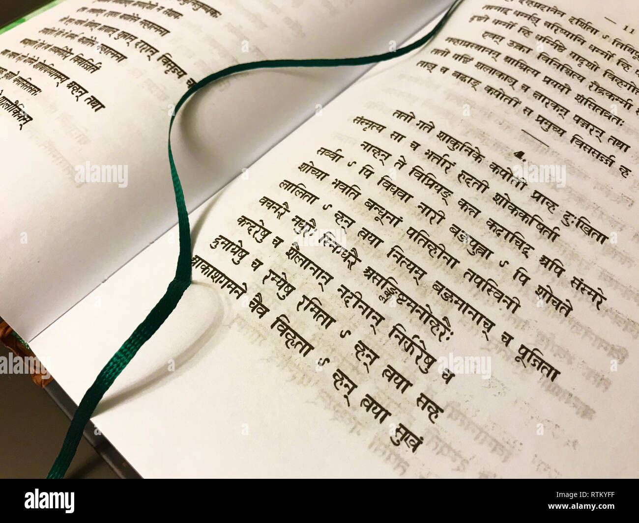 An ancient Buddhist text in Sanskrit etched into a book at