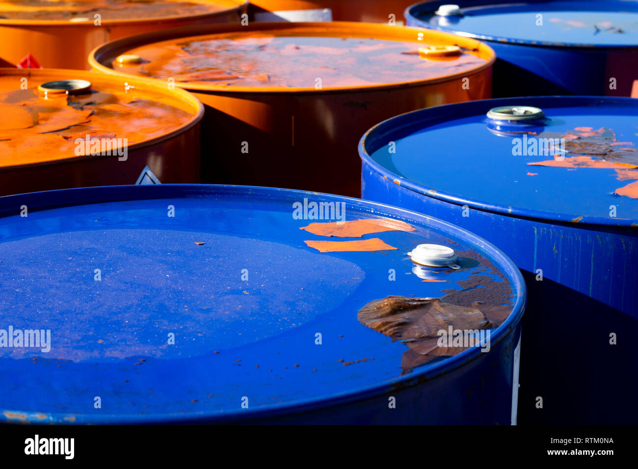 Top of 200 litre 55 US gallon empty gasoline drums in storage area