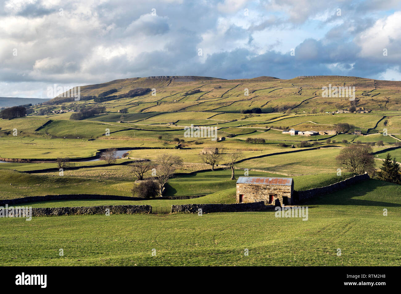 View north-west along Wensleydale, near Hawes, Yorkshire Dales National Park. River Ure in the centre and Stags Fell and Abbotside Common behind. Stock Photo
