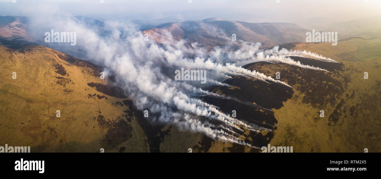 Aerial image of upland heather burning in the Borders region of Southern Scotland. Stock Photo