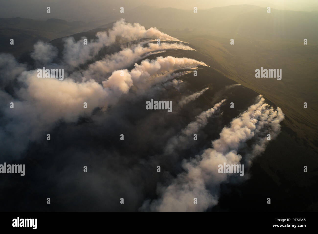 Aerial image of upland heather burning in the Borders region of Southern Scotland. Stock Photo