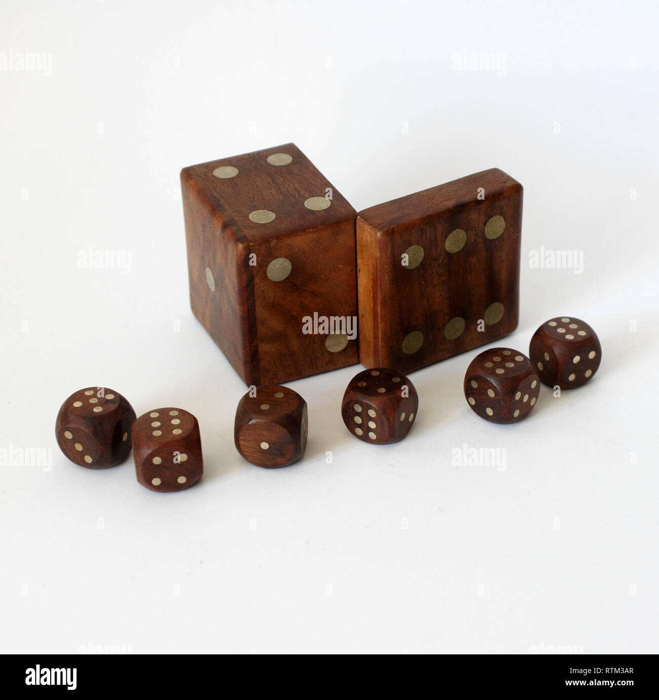 Vintage wooden cube with dice for board games Stock Photo