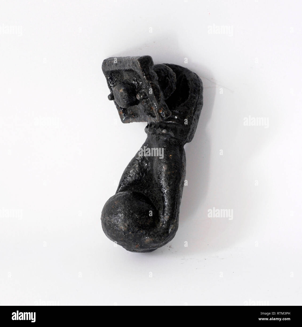 Antique black metal door knocker Stock Photo