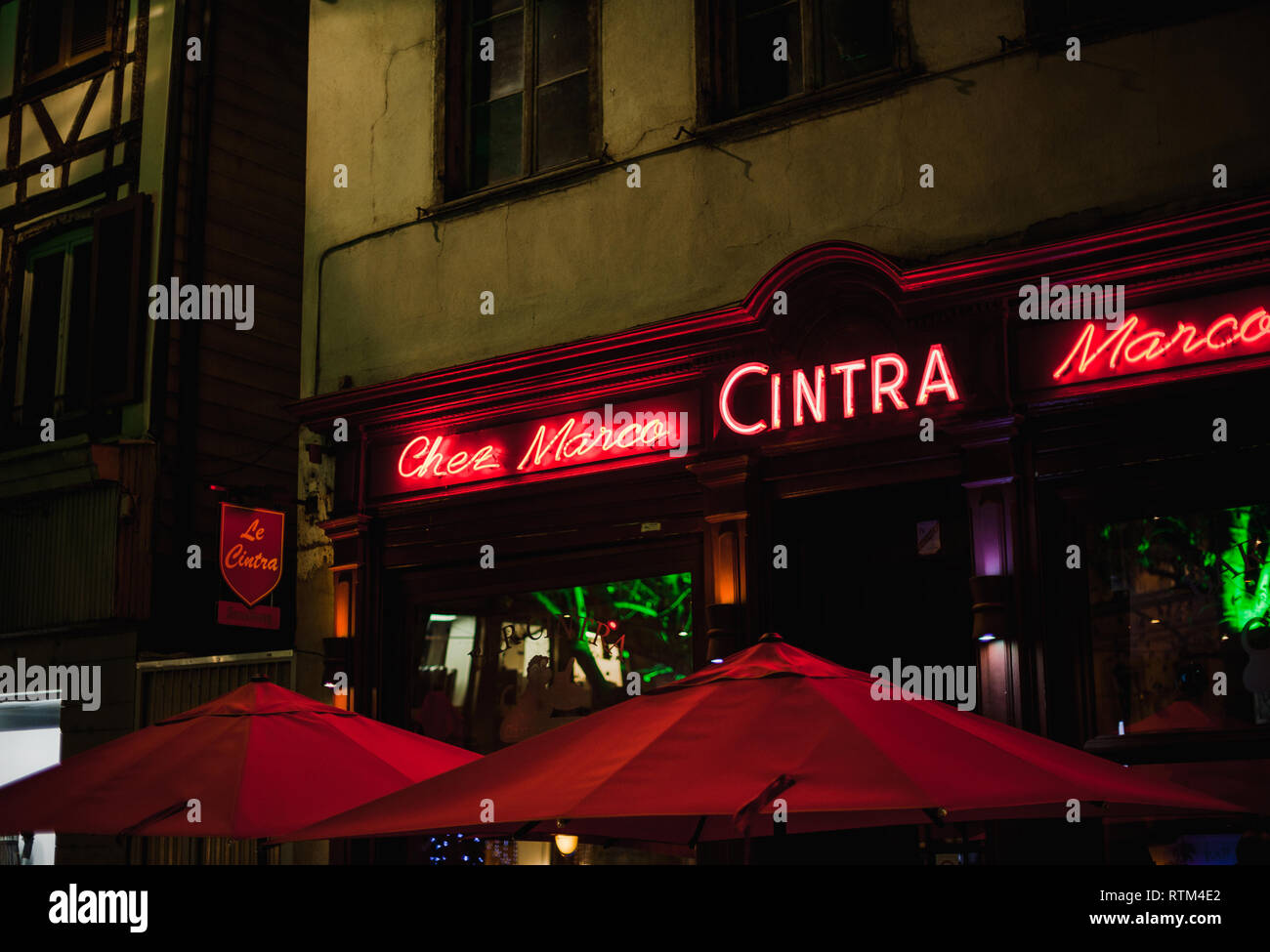 STRASBOURG, FRANCE - DEC 23, 2017: CINTRA neon light Chez Marco traditional  French pub serving food and drinks in Strasbourg, France Stock Photo - Alamy