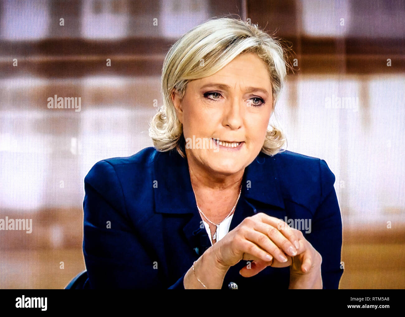 PARIS, FRANCE - MAY 3, 2017: Marine Le Pen - candidates in the French presidential election at the France 2 television debate with Emmanuel Macron Stock Photo