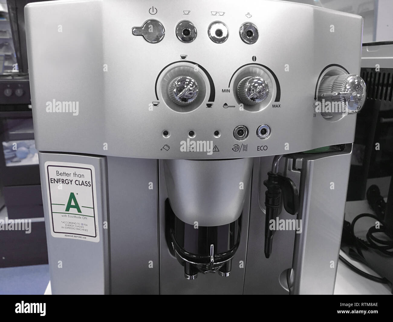 automatic coffee machines at exhibition on white kitchen background Stock Photo